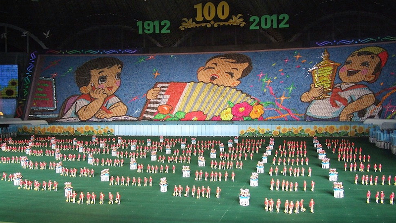 Illustration for article titled The Amazing, Colorful Flip Card Propaganda Mosaics of North Korea